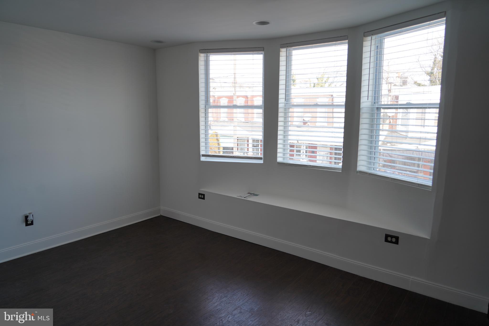 1234 North 56th Street Philadelphia, PA 19131 - Photo 14 of 31 a view of an empty room with a window