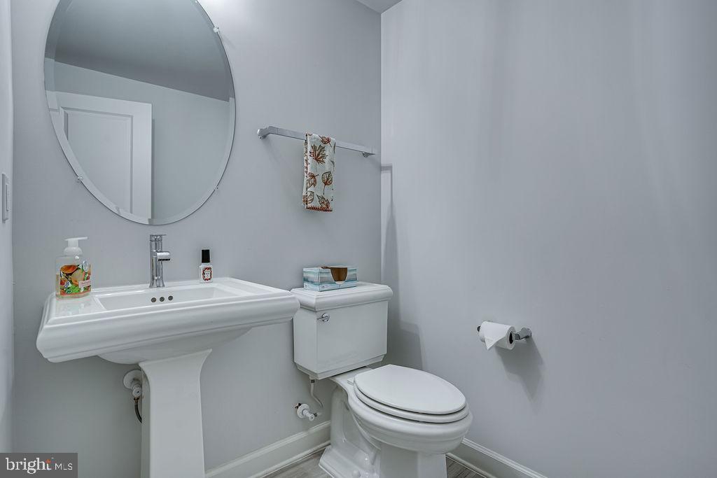 518 Triggerfish Drive Oxon Hill, MD 20745 - Photo 16 of 35 a bathroom with a sink mirror and toilet