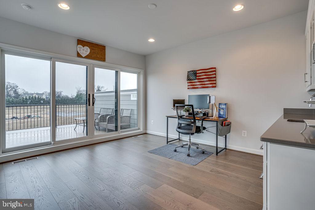 518 Triggerfish Drive Oxon Hill, MD 20745 - Photo 25 of 35 a work room with furniture and a floor to ceiling window
