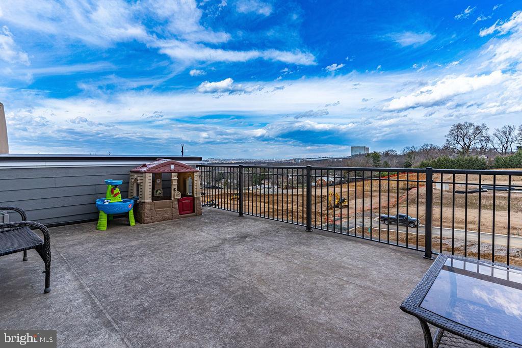 518 Triggerfish Drive Oxon Hill, MD 20745 - Photo 32 of 35 a view of a terrace with a bench