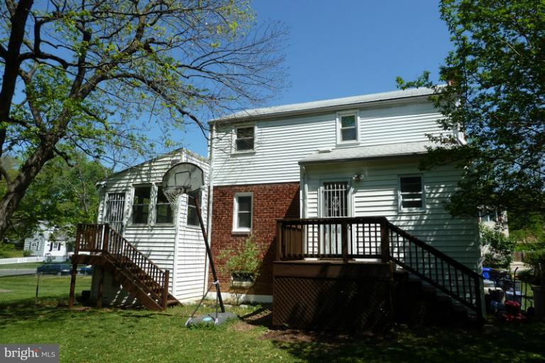 1603 Moffet Road Silver Spring, MD 20903 - Photo 15 of 30 a front view of a house with a garden