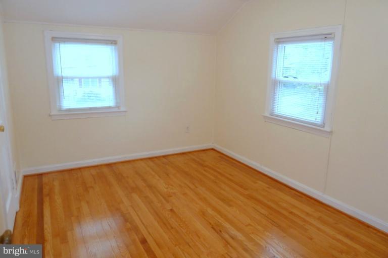 1603 Moffet Road Silver Spring, MD 20903 - Photo 17 of 30 wooden floor in an empty room