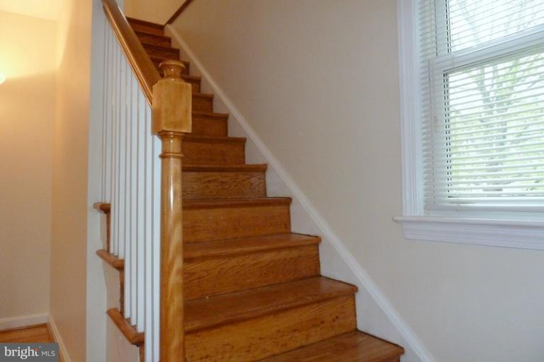 1603 Moffet Road Silver Spring, MD 20903 - Photo 22 of 30 a view of entryway and hall with wooden floor