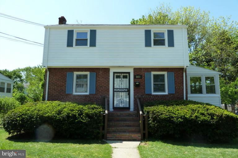 1603 Moffet Road Silver Spring, MD 20903 - Photo 30 of 30 a front view of a house with a yard