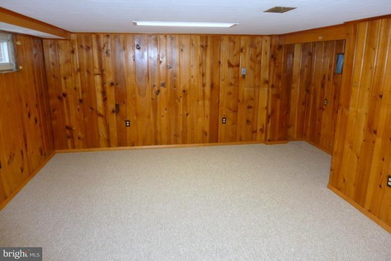 1603 Moffet Road Silver Spring, MD 20903 - Photo 5 of 30 a view of a room with a wooden door