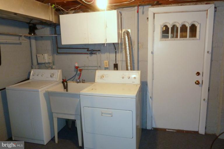 1603 Moffet Road Silver Spring, MD 20903 - Photo 8 of 30 a utility room with dryer and washer