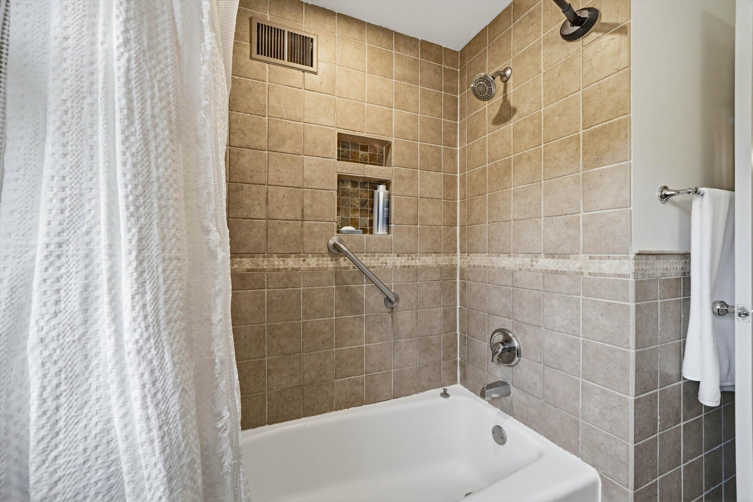 9431 Hawthorne Road Mequon, WI 53097 - Photo 31 of 67 Tiled shower in main upper bath