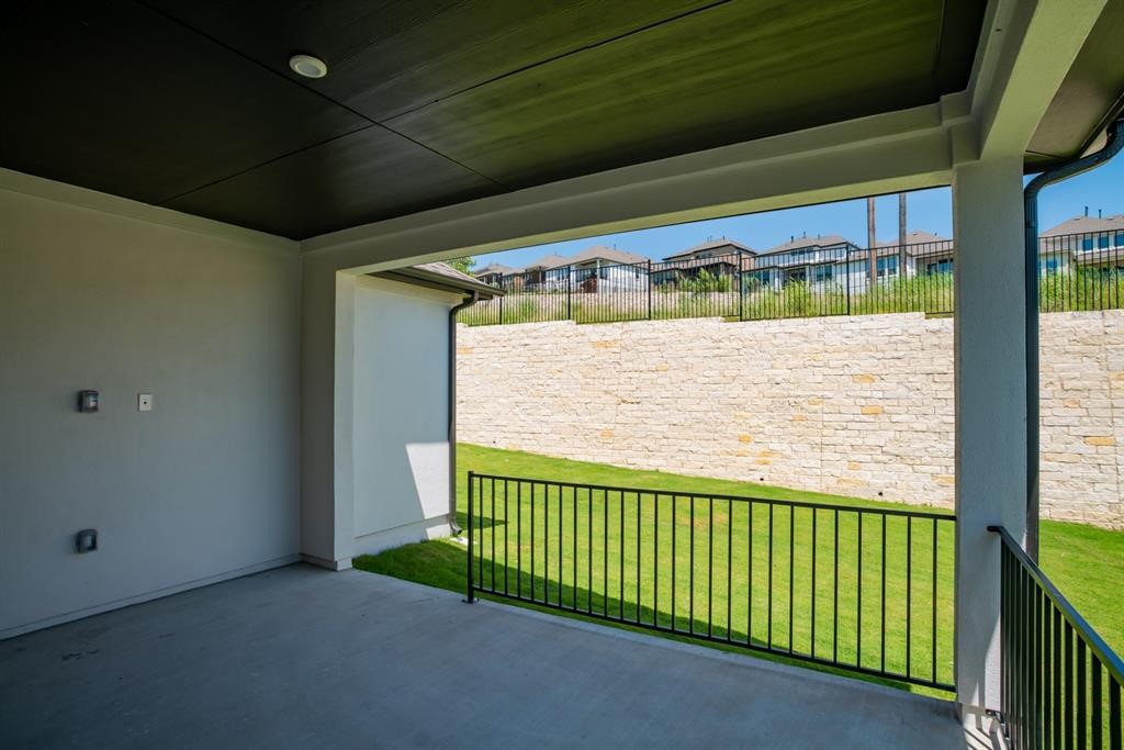 4612 Modena Bay Bend Leander, TX 78641 - Photo 28 of 34 View of patio / terrace with a residential view