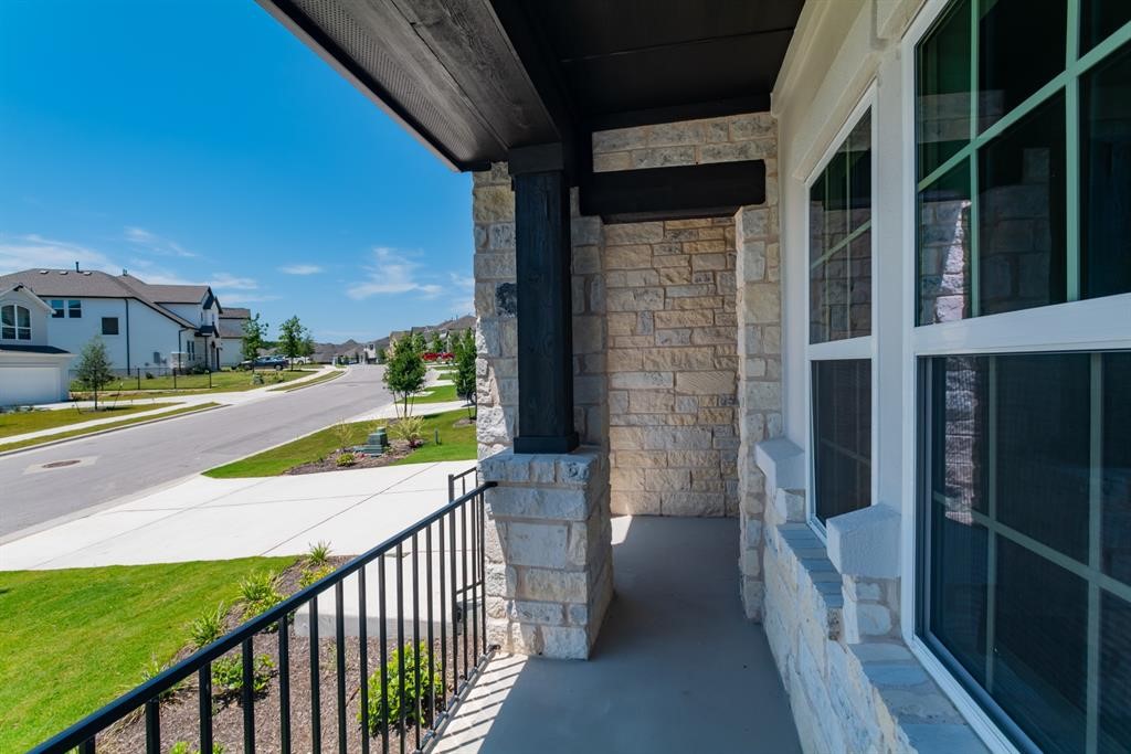 4612 Modena Bay Bend Leander, TX 78641 - Photo 3 of 34 Porch with a residential view