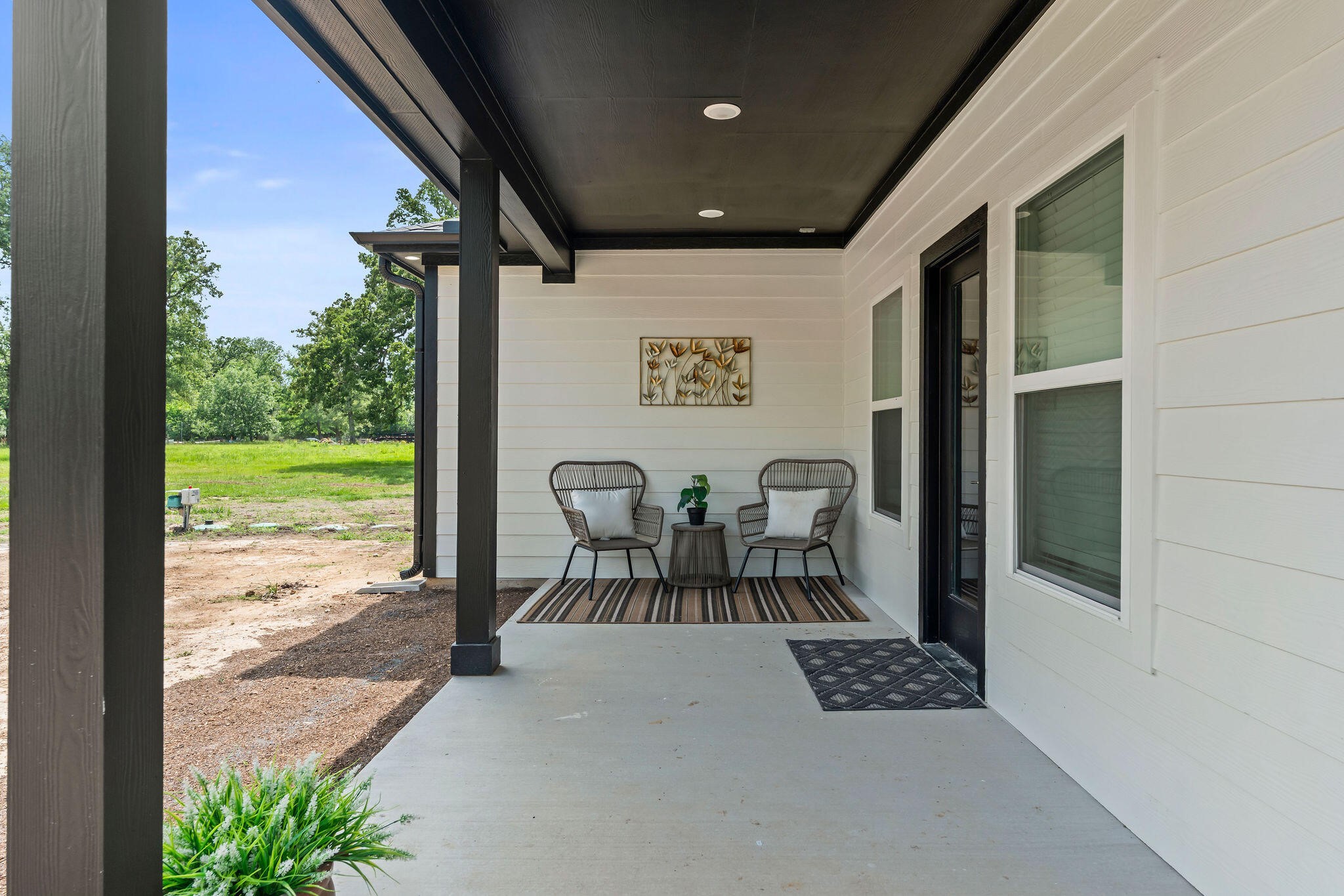 39645 Bosque Road Hempstead, TX 77445 - Photo 29 of 37 a view of a porch with furniture and yard