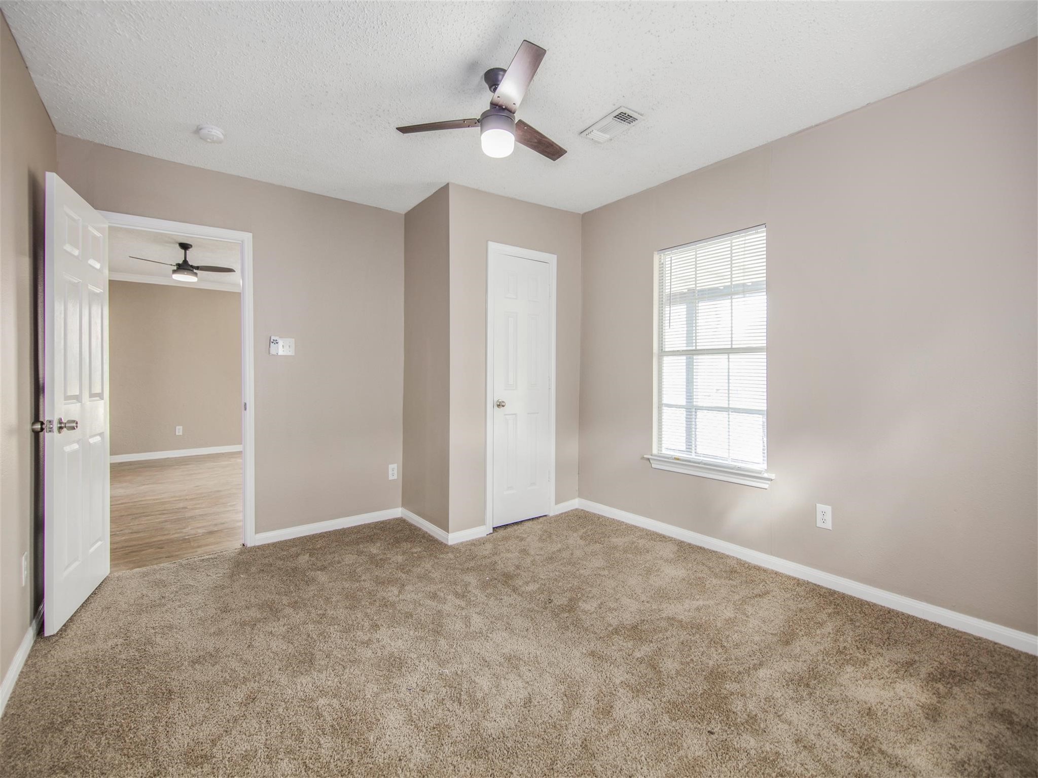 5108 Clay Street Houston, TX 77023 - Photo 17 of 21 a view of an empty room with a window