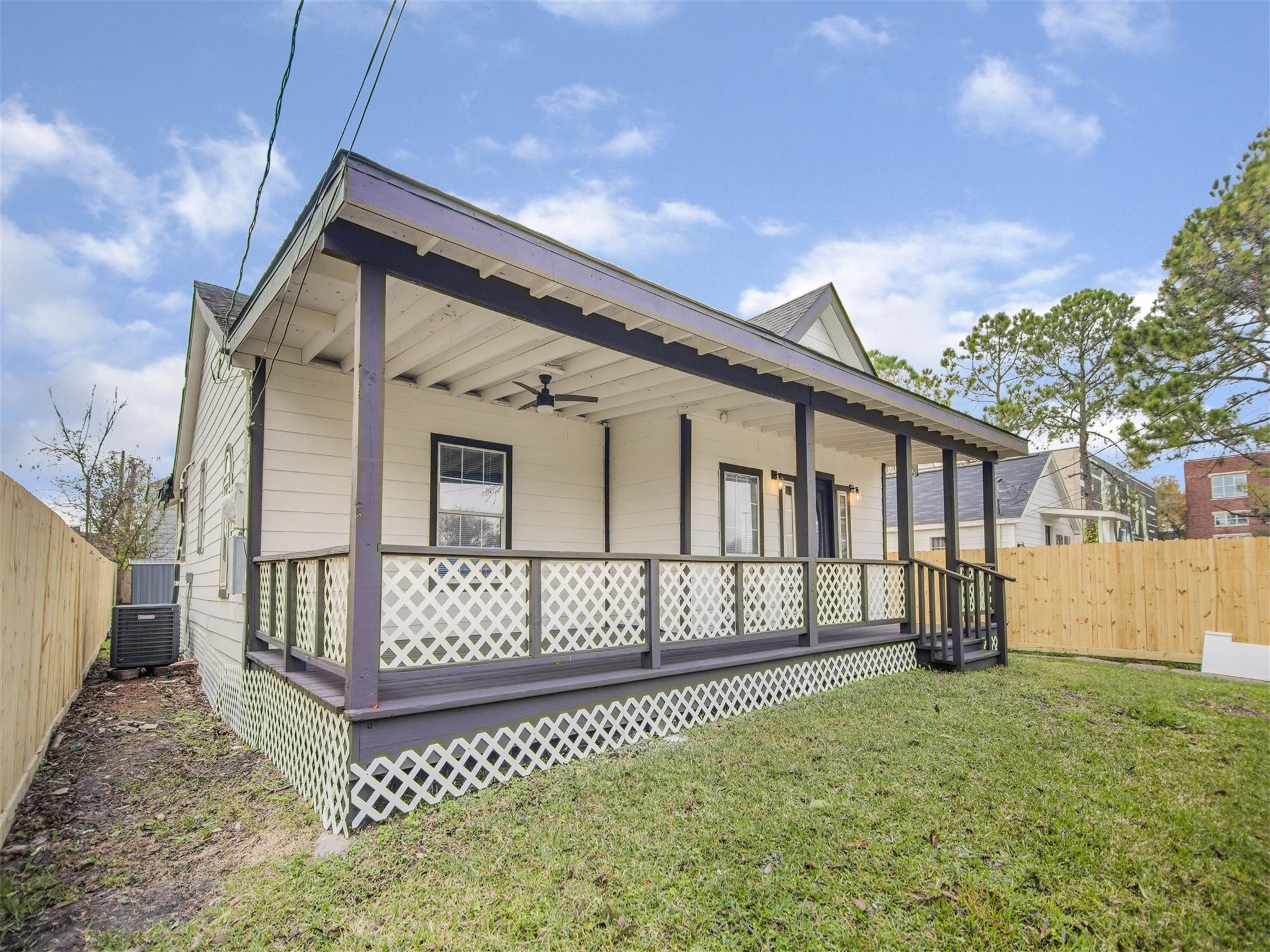 5108 Clay Street Houston, TX 77023 - Photo 4 of 21 a front view of a house with a yard