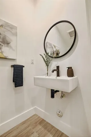 a large kitchen with a lot of counter space and stainless steel appliances