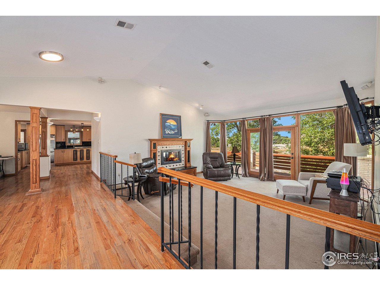 427 Goose Hollow Road Berthoud, CO 80513 - Photo 6 of 40 Step-Down into the Great Room