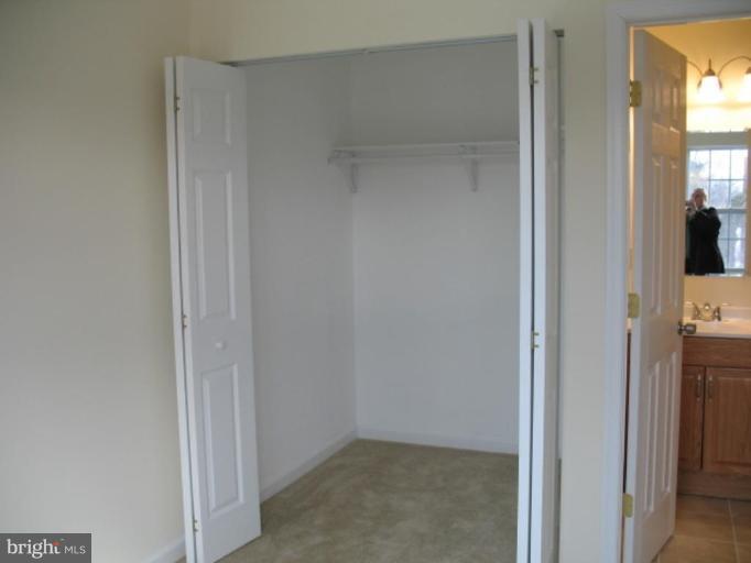 2617 Weisman Road Silver Spring, MD 20902 - Photo 22 of 25 a view of a bathroom from a hallway