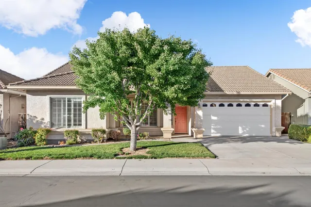 front view of house with a yard