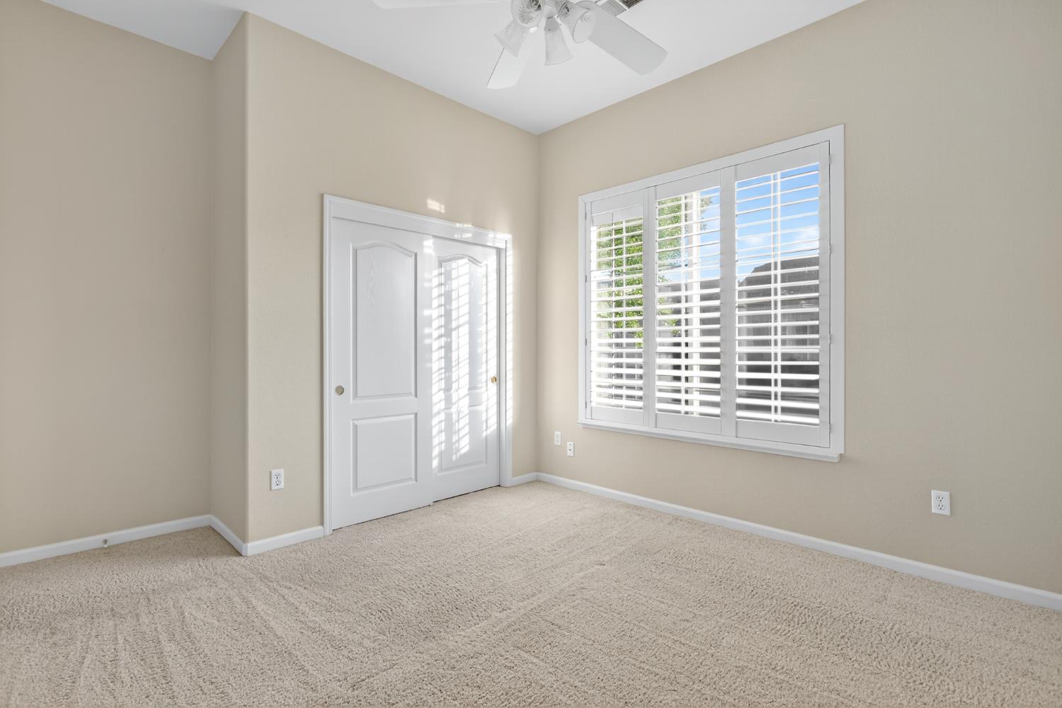 3409 Sugar Oak Court Modesto, CA 95355 - Photo 22 of 28 a view of an empty room with a window
