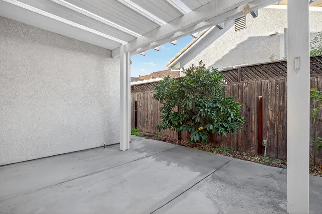 a view of entryway with flower pots