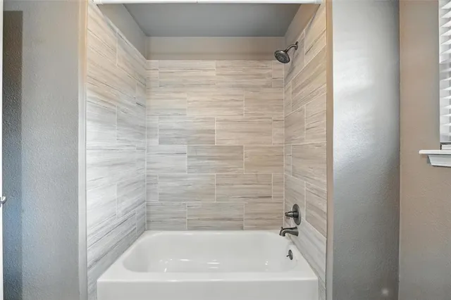 a close up of a bathtub