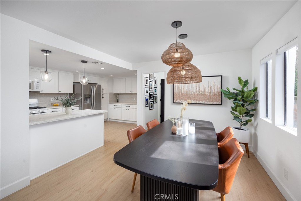 910 Ocean View Avenue, Unit E Monrovia, CA 91016 - Photo 12 of 39 a very nice looking dining room with a table and chairs