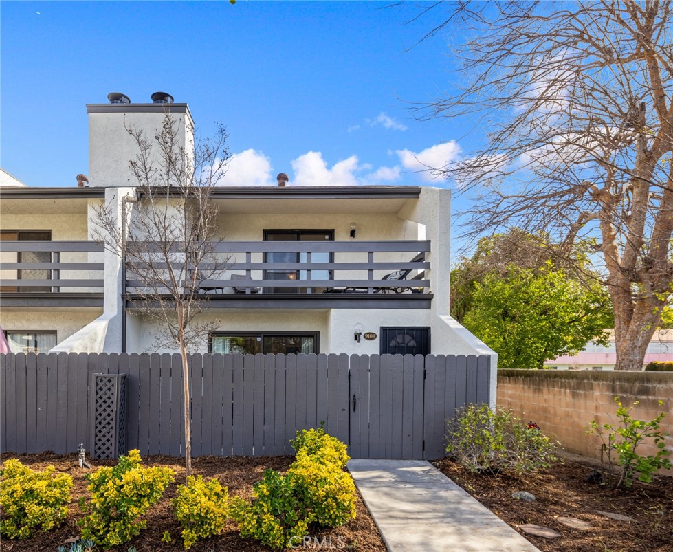 910 Ocean View Avenue, Unit E Monrovia, CA 91016 - Photo 2 of 39 a view of a house with a wooden fence