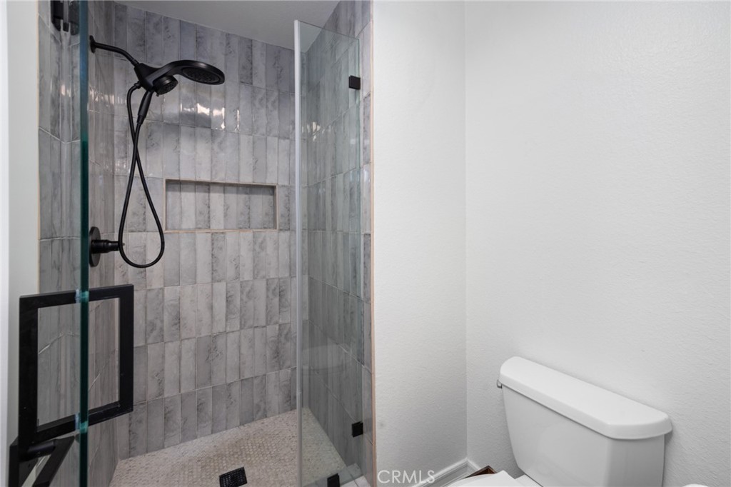 910 Ocean View Avenue, Unit E Monrovia, CA 91016 - Photo 23 of 39 a bathroom with a shower toilet and sink