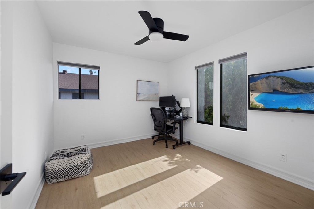 910 Ocean View Avenue, Unit E Monrovia, CA 91016 - Photo 27 of 39 a living room with furniture and a ceiling fan