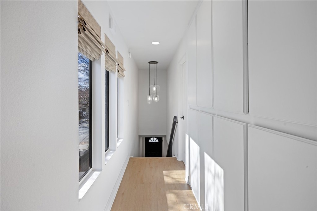 910 Ocean View Avenue, Unit E Monrovia, CA 91016 - Photo 28 of 39 a view of a hallway with windows and entryway