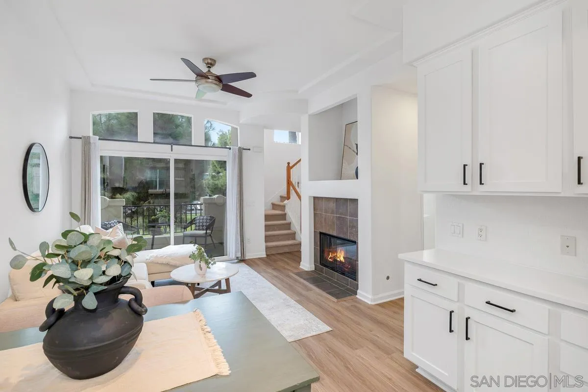 2842 Farragut Road, Unit 131 San Diego, CA 92106 - Photo 13 of 41 a living room with furniture fireplace and a large window