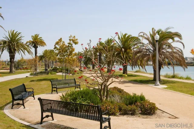 a view of a swimming pool with lounge chair