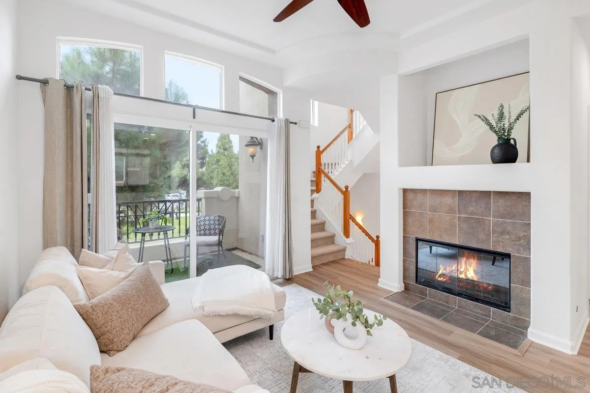 2842 Farragut Road, Unit 131 San Diego, CA 92106 - Photo 6 of 41 a living room with furniture and a fireplace