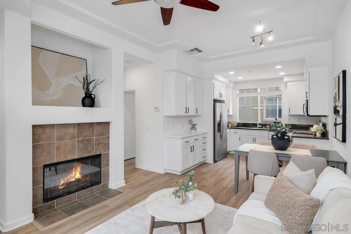2842 Farragut Road, Unit 131 San Diego, CA 92106 - Photo 7 of 41 a living room with furniture and a fireplace