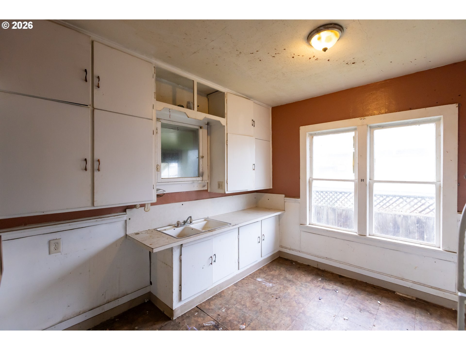 104 1st Street Klickitat, WA 98628 - Photo 13 of 48 a kitchen with a stove and a window