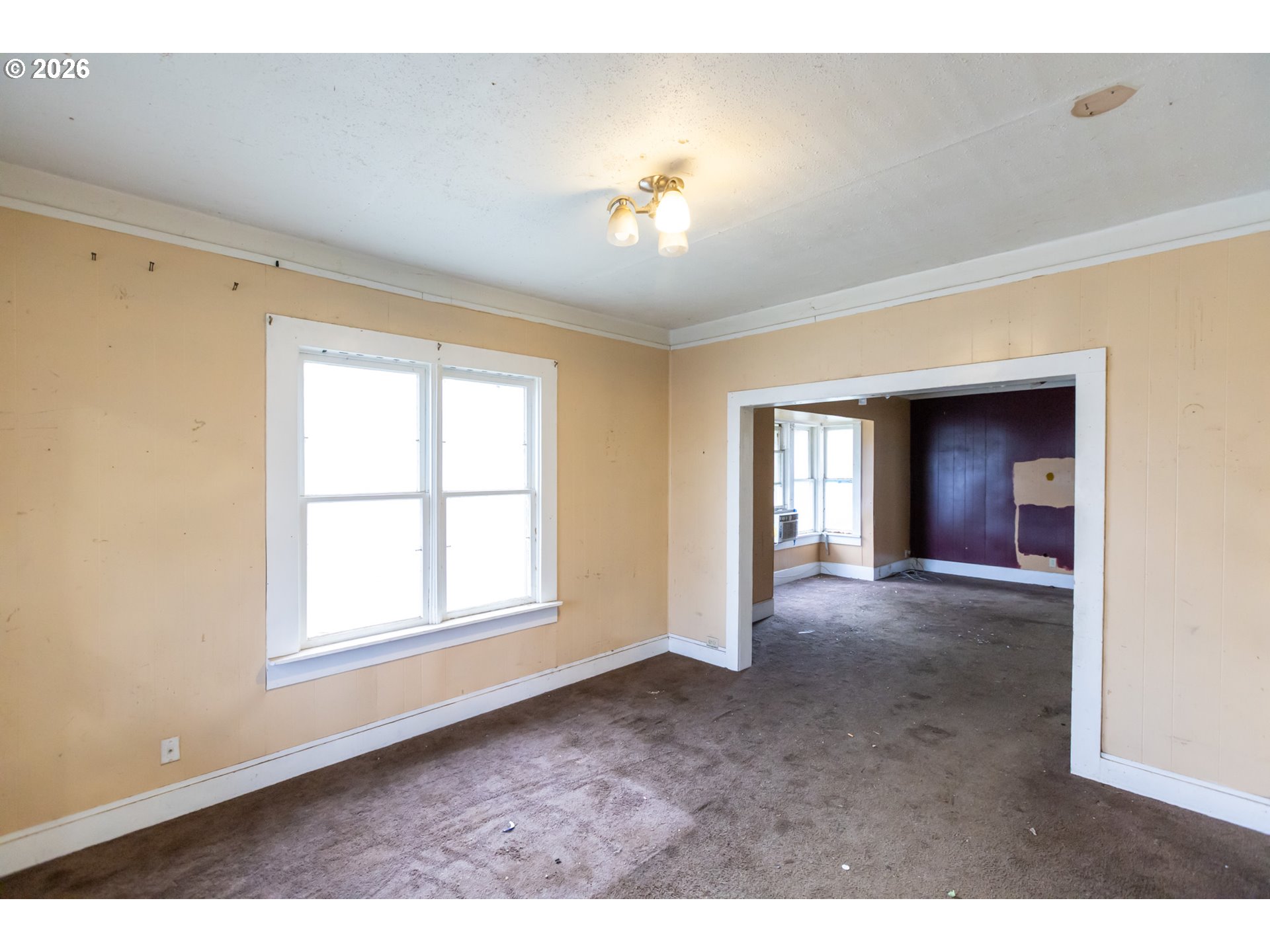 104 1st Street Klickitat, WA 98628 - Photo 7 of 48 a view of an empty room with a window
