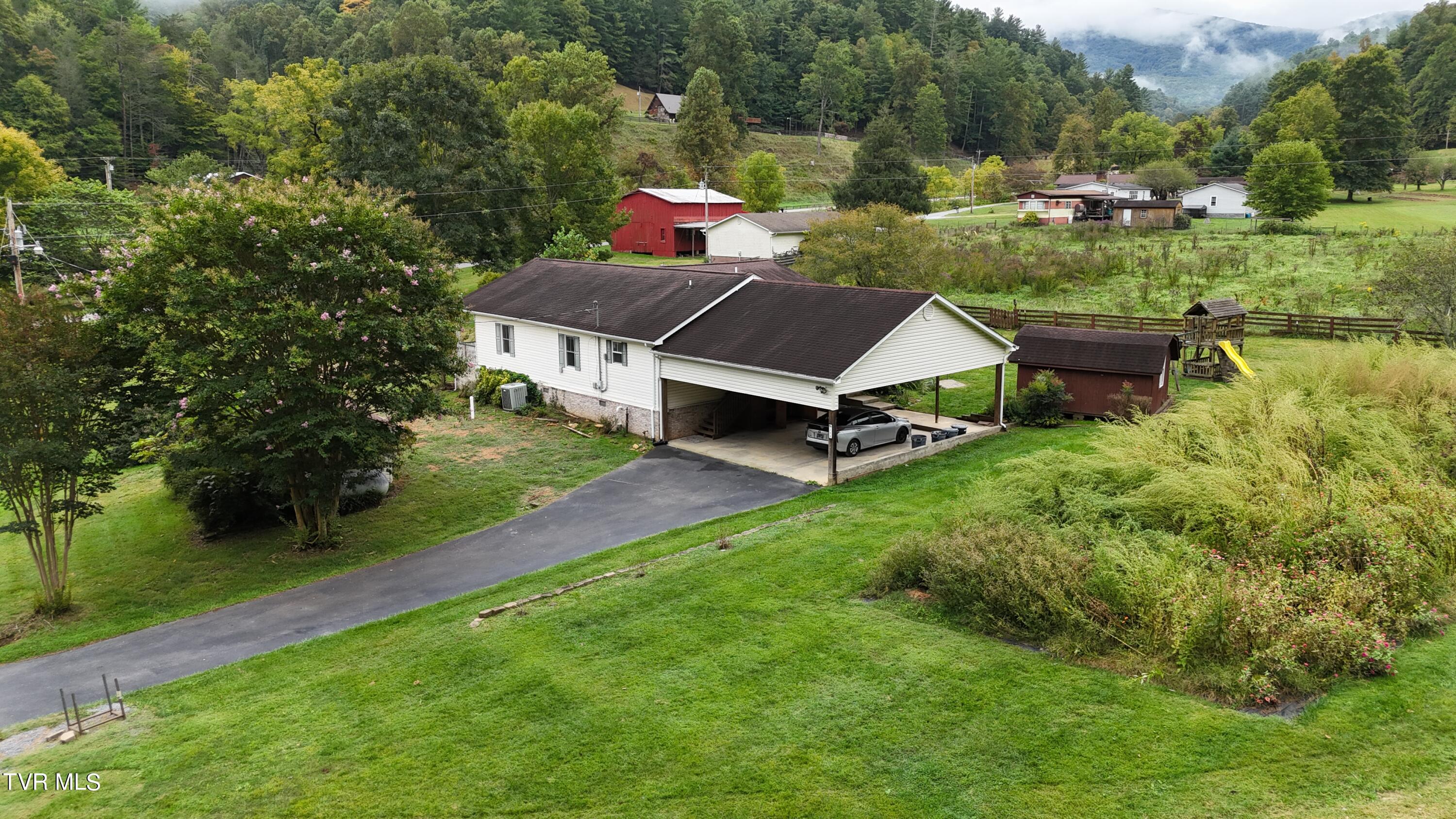 108 Sam Miller Road Erwin, TN 37650 - Photo 25 of 43 DJI_20240918102720_0005_D