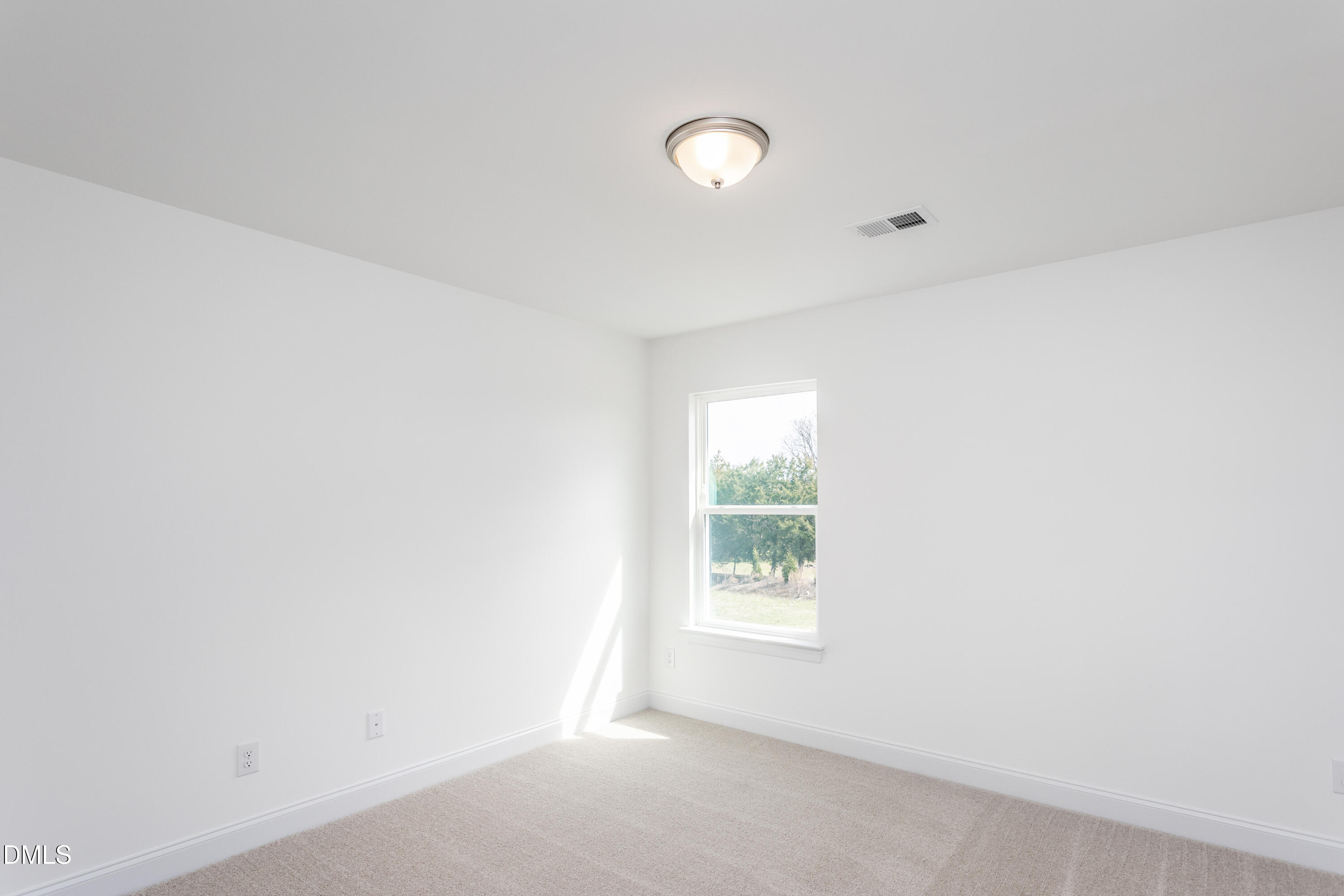 102 Bittersweet Trail Benson, NC 27504 - Photo 18 of 30 an empty room with windows