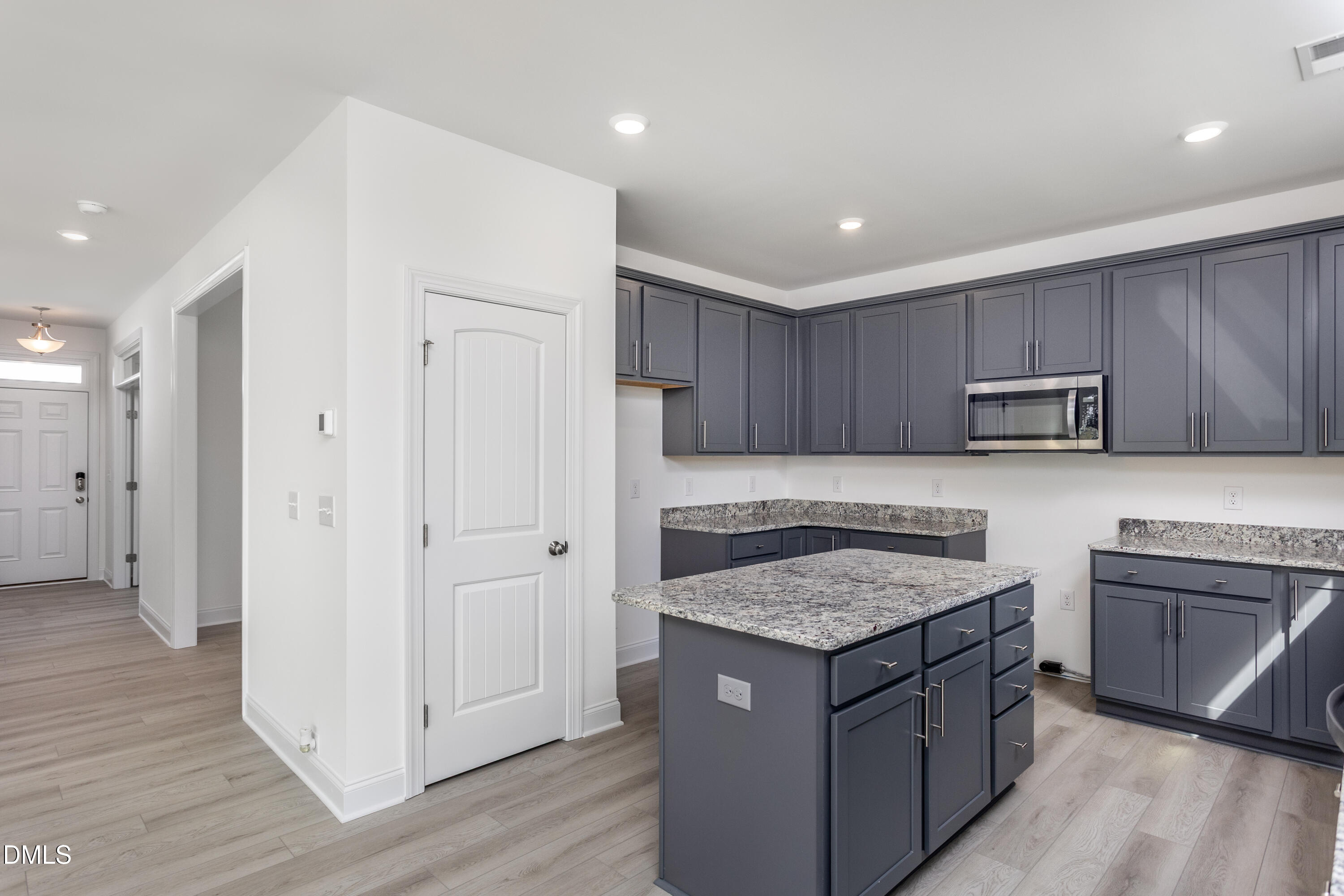 102 Bittersweet Trail Benson, NC 27504 - Photo 10 of 30 a kitchen with granite countertop granite top and stainless steel appliances