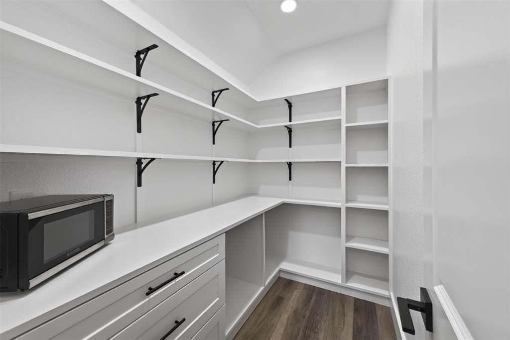 112 Spring Circle Red Oak, TX 75154 - Photo 9 of 21 This pantry if a dream. Plenty of storage.