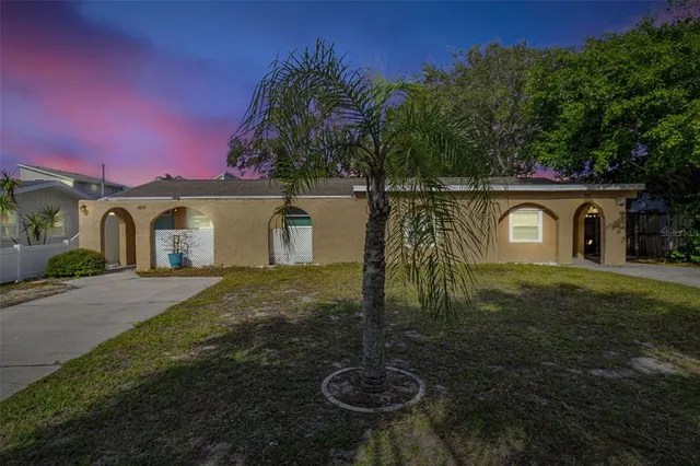 a house view with a garden space