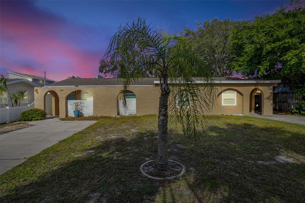 a house view with a garden space