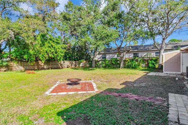 a view of yard with tree s