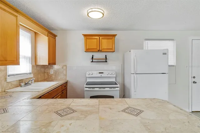 a bathroom with a bathtub and a sink