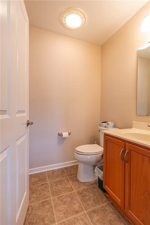 425 Chestnut Lane Apollo, PA 15613 - Photo 30 of 48 a bathroom with a toilet a sink and vanity