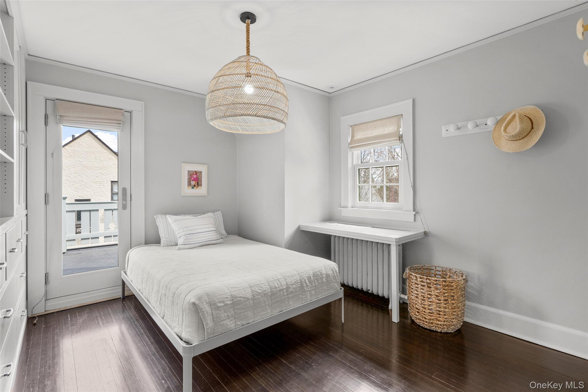 35 Wildwood Road New Rochelle, NY 10804 - Photo 21 of 30 Bedroom with Built-ins and door to Deck