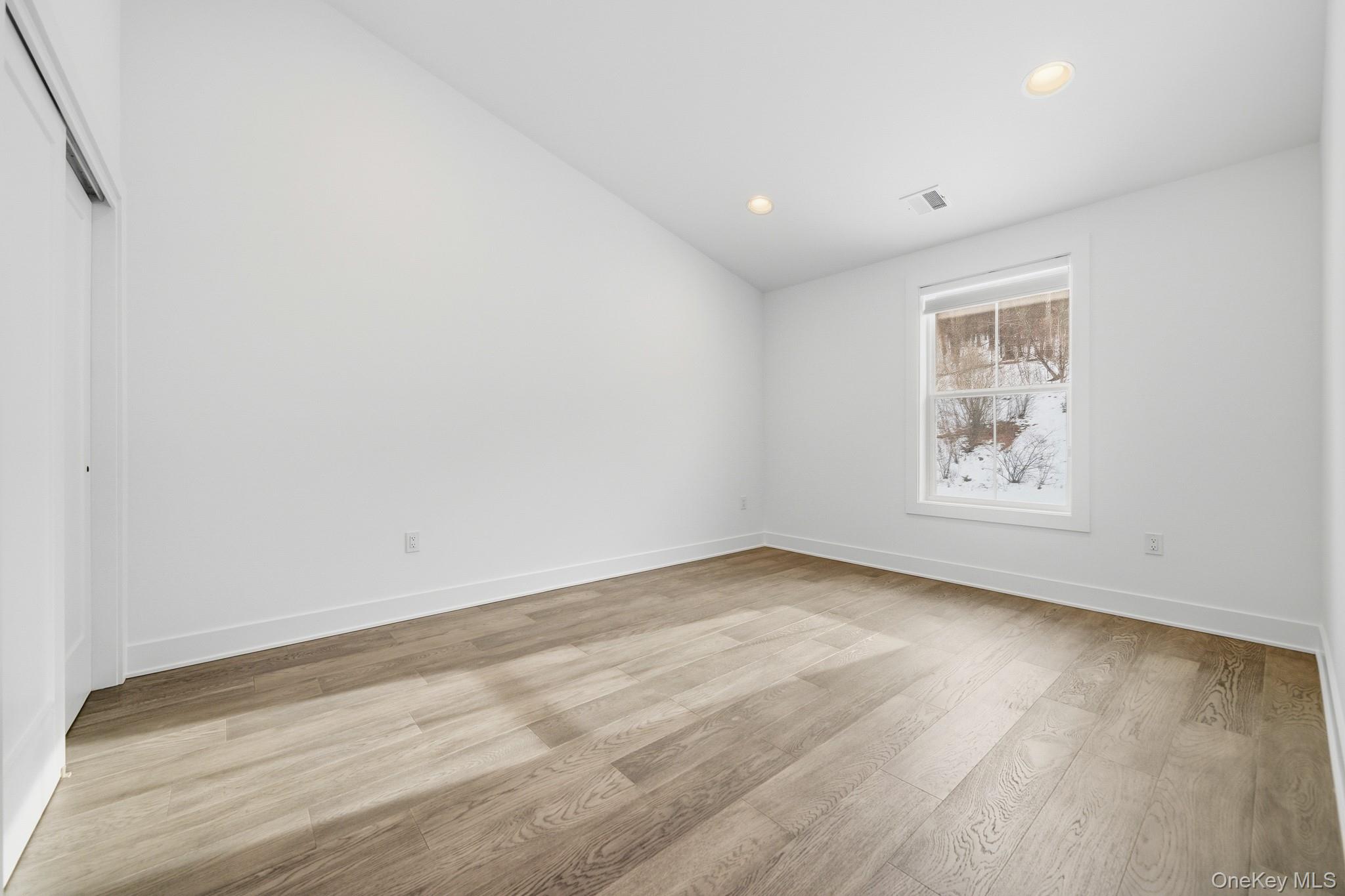 4034 Chestnut Rdg Road, Unit 62 Fishkill, NY 12524 - Photo 28 of 31 Additional Bonus room with vaulted ceiling, light wood-style flooring, and recessed lighting