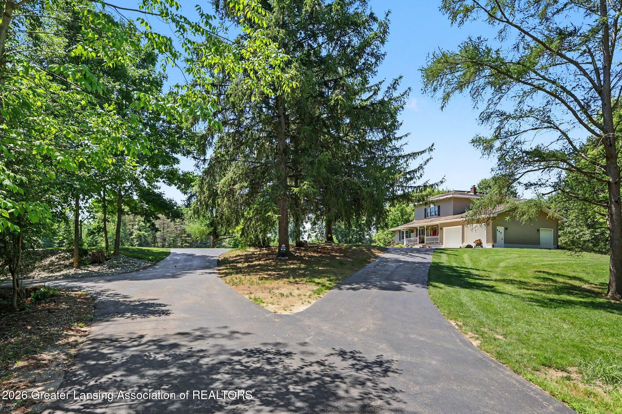 905 West Dansville Road Mason, MI 48854 - Photo 46 of 50 Paved Circle Drive