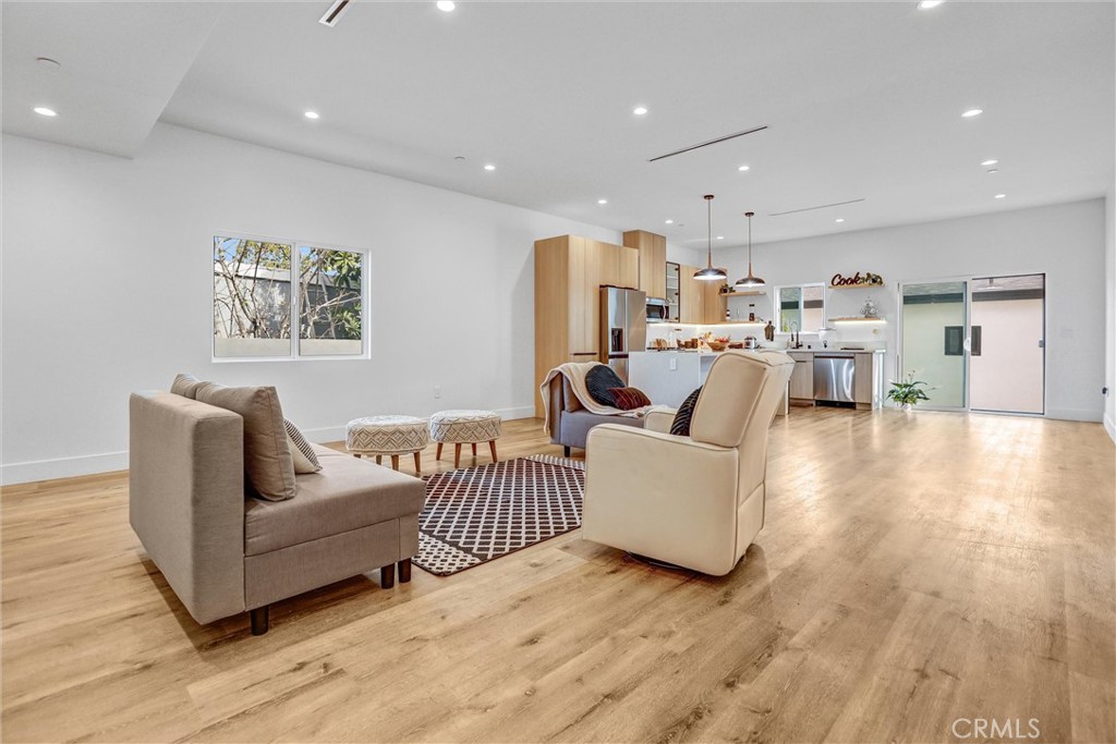6900 Corbin Avenue Reseda, CA 91335 - Photo 21 of 50 a living room with furniture and a large window