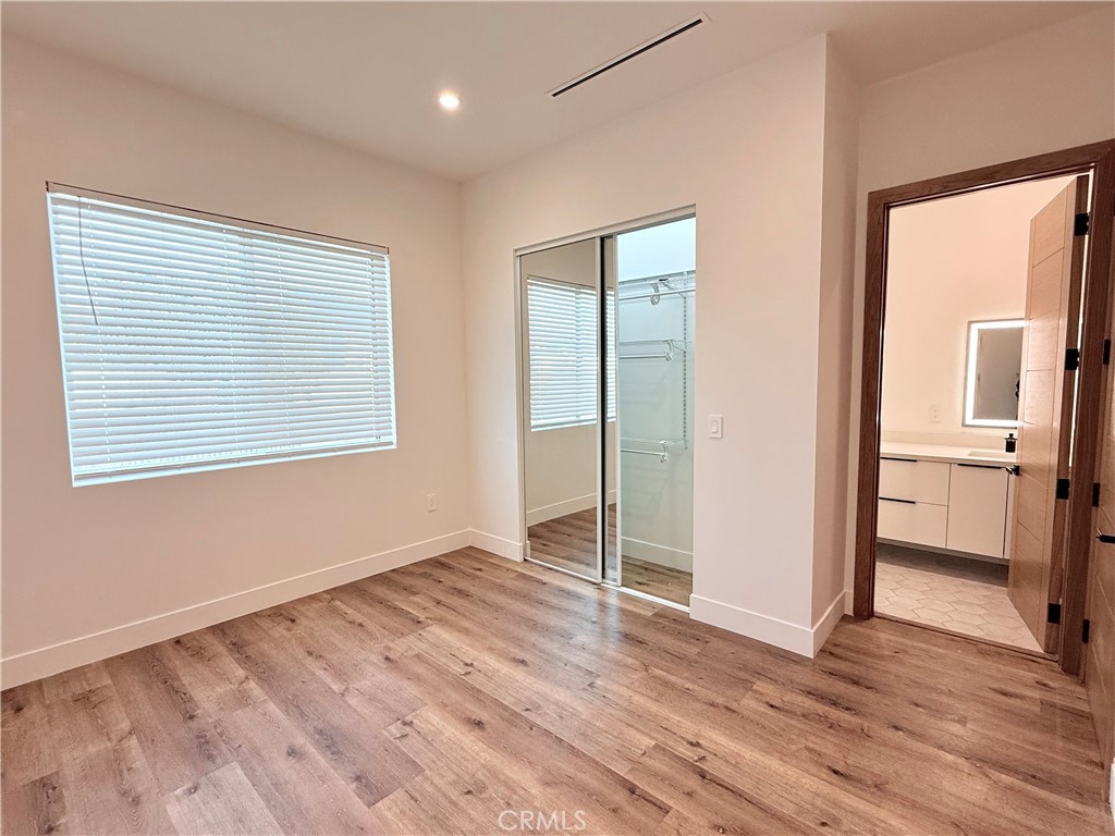 6900 Corbin Avenue Reseda, CA 91335 - Photo 41 of 50 wooden floor in an empty room with a window