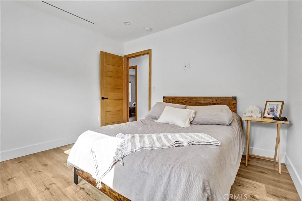 6900 Corbin Avenue Reseda, CA 91335 - Photo 8 of 50 a bedroom with a bed and a night stand