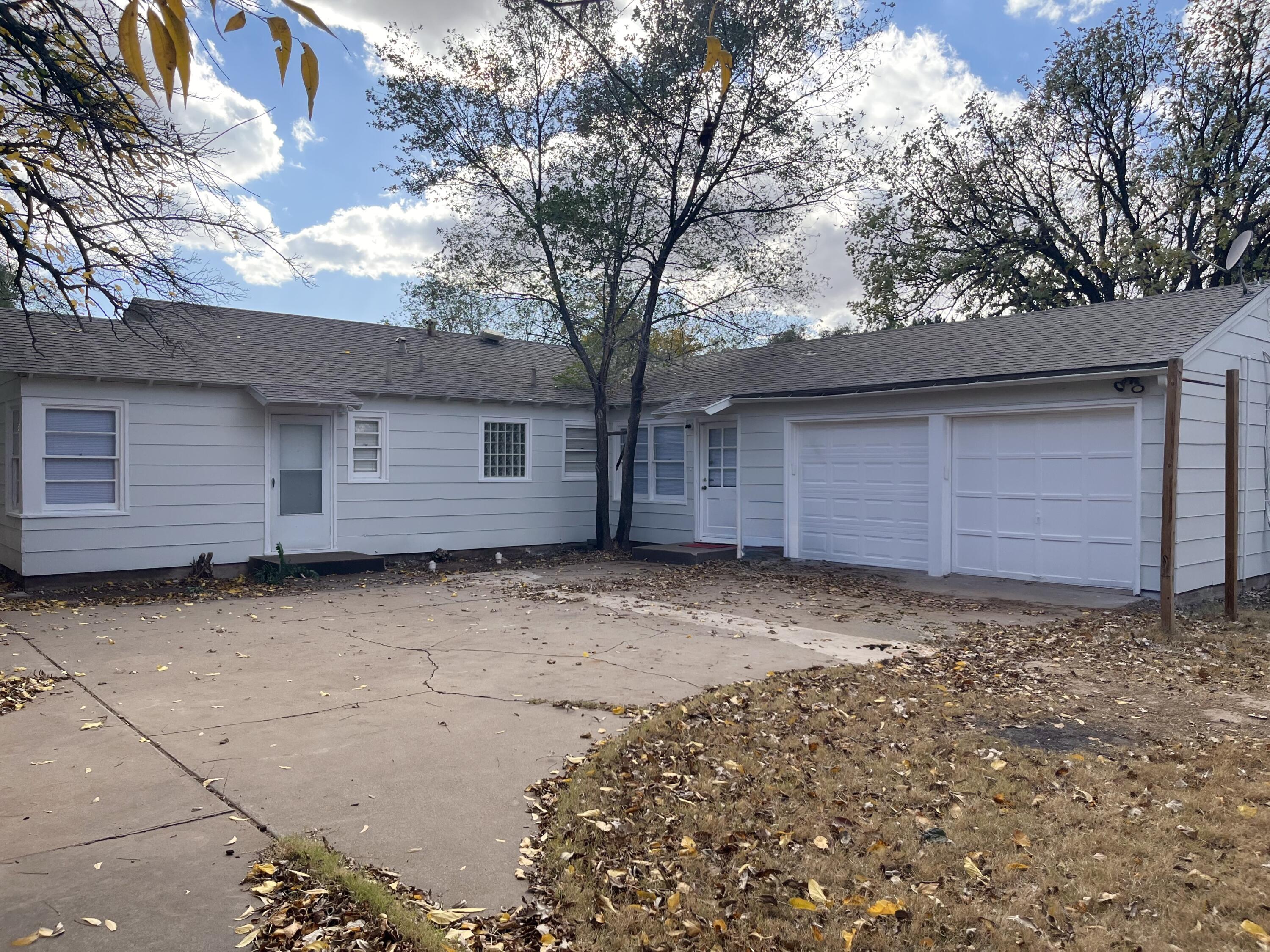 3708 27th Street Lubbock, TX 79410 - Photo 23 of 23 a view of a house with a yard